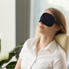 Woman sleeping with a Finvizo contoured sleep mask