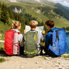 Three hikers wearing colorful Finvizo backpacks on a trail