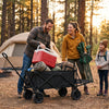 Finvizo family loading camping gear into collapsible off road wagon at sunny campsite