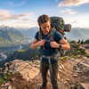 Finvizo 50L Ventilated Hiking Backpack with adjustable straps on mountain trail - adjust backpack straps comfort
