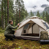 Finvizo 2-Person Lightweight Backpacking Tent for waterproof tent before camping - Camper sealing tent seams with seam grip outdoors in rain