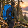 Finvizo 55L hunting backpack on a forest trail at dawn - hunting backpack