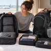 Finvizo hiking pack beside compressed travel clothing - vacuum backpack