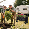 Finvizo folding wagon cart hauling plants during backyard garden work