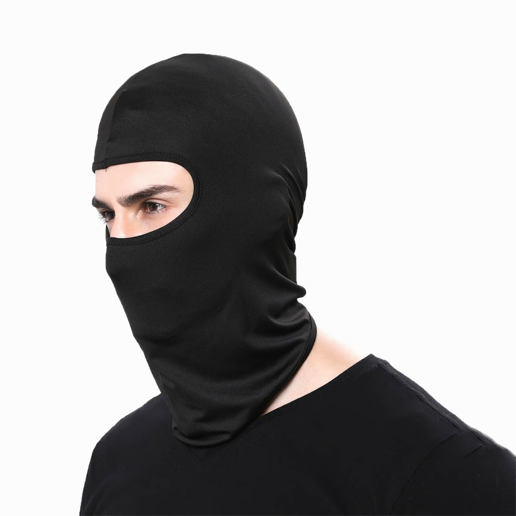 man wearing black Finvizo balaclava pulled over nose in profile view