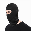 man wearing black Finvizo balaclava pulled over nose in profile view