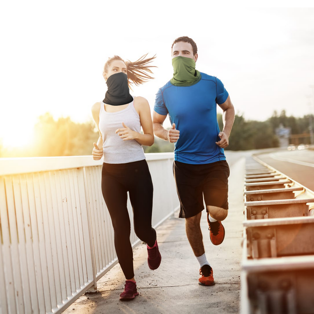 Two runners wearing Finvizo cooling neck gaiters on bridge at sunrise