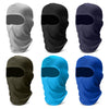 Rider wearing a Finvizo cooling balaclava under a motorcycle helmet for sun protection and heat management