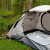 Finvizo 2-person lightweight backpacking tent set up in the forest with gear inside