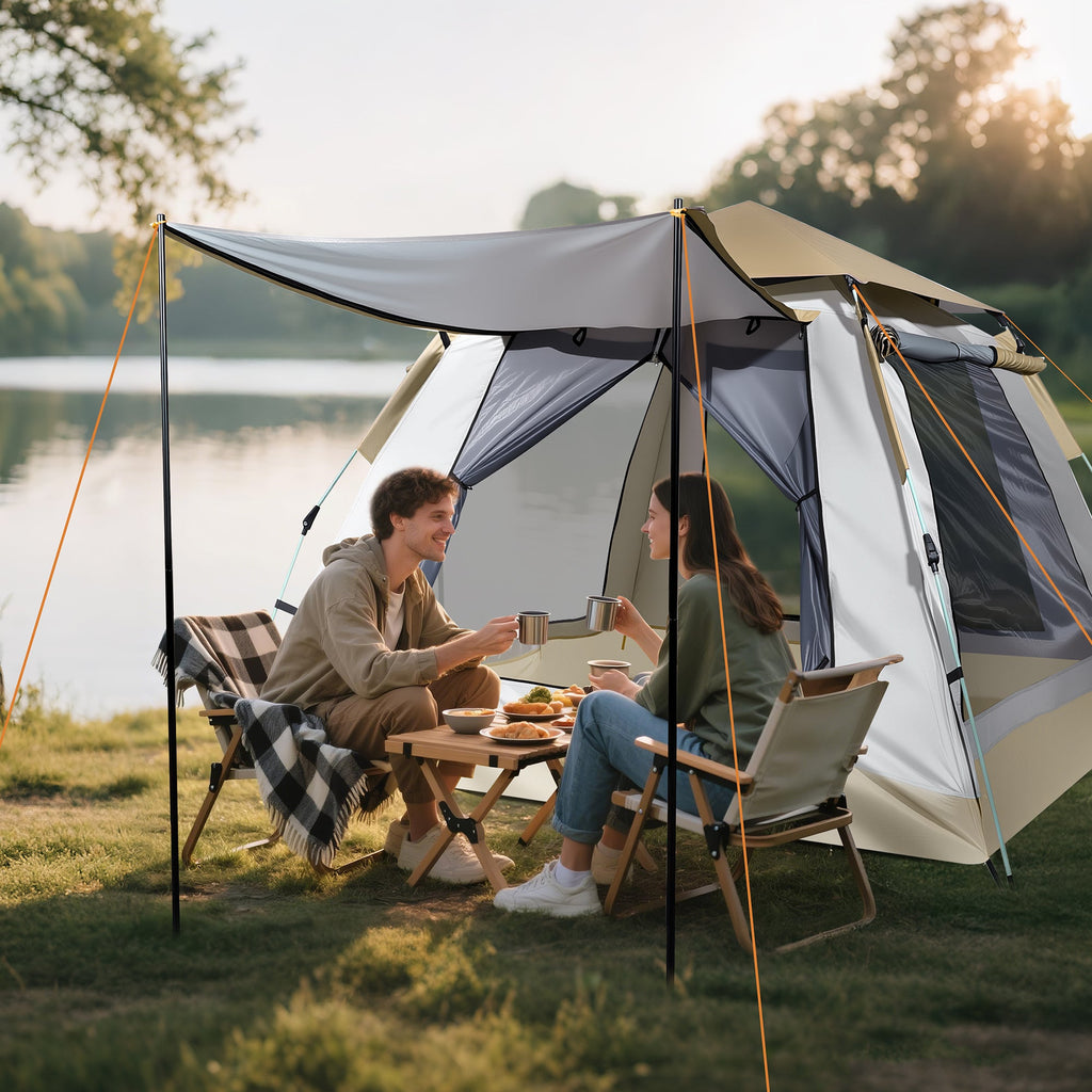Campers relaxing by the lake next to Finvizo pop up tent with porch