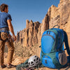 Finvizo 45L backpack at the base of a climbing crag - rock climbing day trip minimal gear
