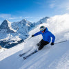 Finvizo skier wearing blue balaclava on snowy mountain peak