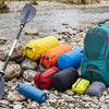 Finvizo camping gear set up at riverside campsite with tent