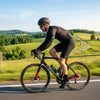 Finvizo UV arm sleeves for cyclist on sunny road ride — sun protection cycling sleeves vs cream