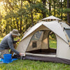 Camper cleaning a Finvizo tent at campsite after a trip — tent maintenance cleaning waterproofing