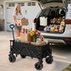 Loading a Finvizo collapsible wagon cart with heavy gear at an SUV trunk