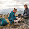 Finvizo camper demonstrating wilderness first aid at mountain campsite - wilderness first aid basics ca