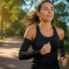 Finvizo woman runner wearing UPF 50+ cooling sleeves outdoors - arm sleeves for women