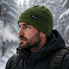 `Finvizo cuffed knit beanie worn in a snowy forest - wool beanie`