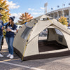 Finvizo instant dome shelter beside a stadium parking setup - tailgate tent