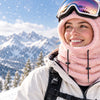 Finvizo pink ski mask worn by a skier on a snowy mountain