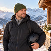 Finvizo ski beanie worn at a snowy ski lodge