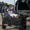 Tailgate party setup with a Finvizo wagon at a stadium parking lot